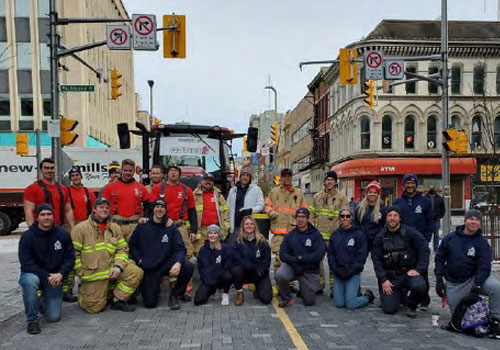 Group photo from Police/Fire Tractor Pull Event