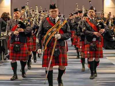 LPS Pipes and Drums, marching and playing musical instruments