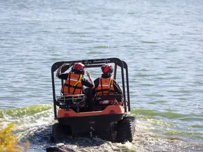 LPS officers driving amphibious vehicle into lake