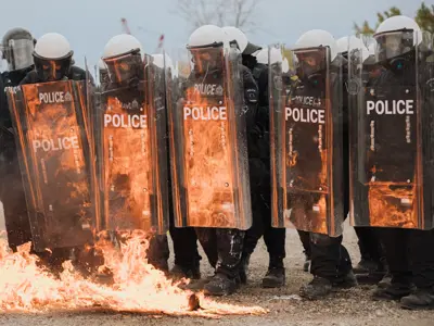 Public Order Unit Training - fire being thrown at shields 
