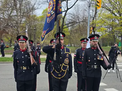 LPS Colour Guard marching across street