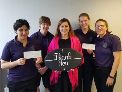 Fundraising & donations to Ways Mental Health, group photo holding Thank you sign