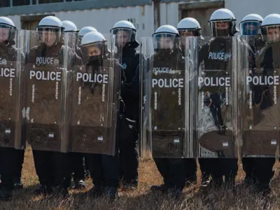 Public Order Unit Training - marching behind clear shields