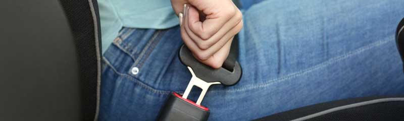occupant in vehicle snapping in seatbelt