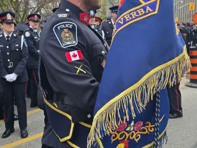 LPS Colour Guard member holding LPS flag