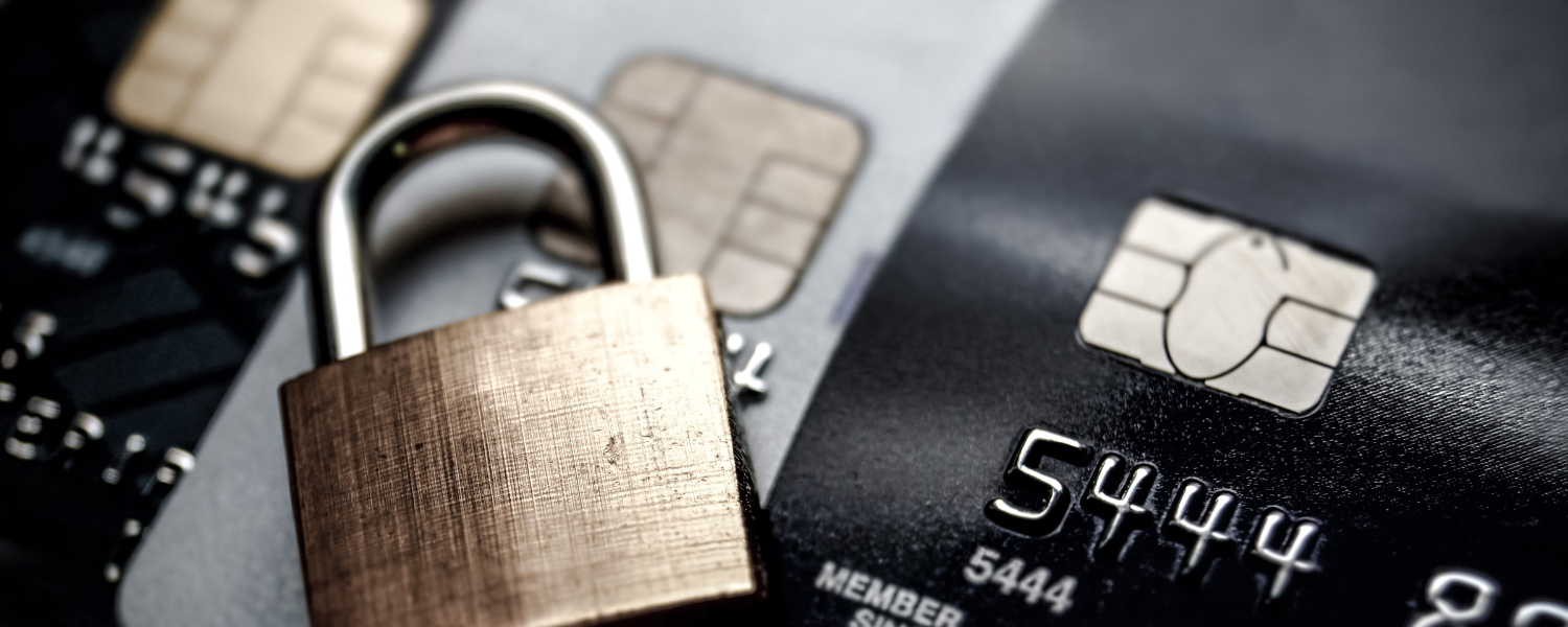 credit cards with a pad lock sitting on top