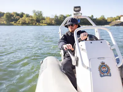 LPS officer in small LPS boat