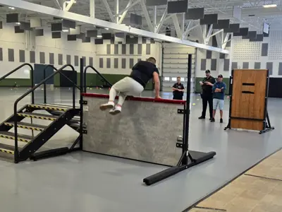 Applicant performing PREP test, jumping over wall