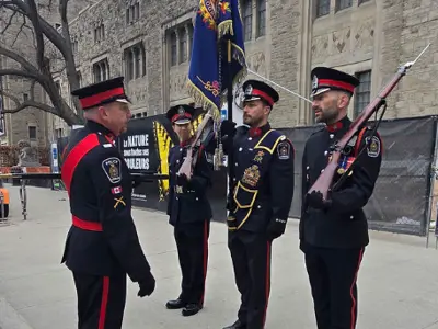 LPS Colour Guard members holding rifles