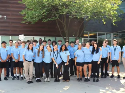 Youth In Policing Initiative students group photo under large tree