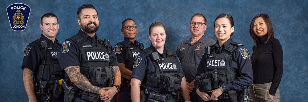 Group photo of diverse LPS members, sworn and civilian